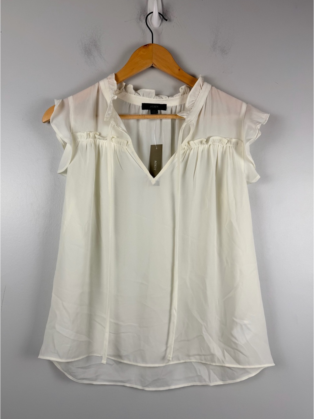 New J. Crew ivory ruffle blouse size XS